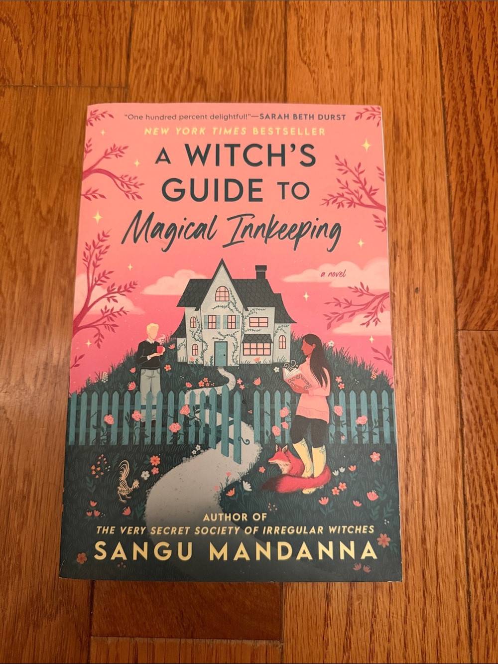 A Witch's Guide to Magical Innkeeping by - Pink Cover Paperback